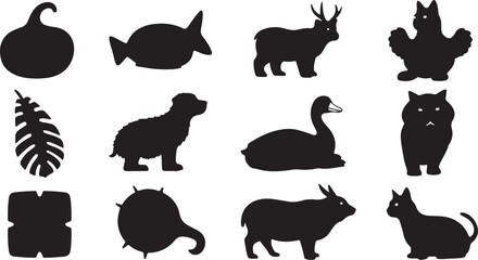 Fototapeta premium Black silhouettes of various animals and leaves on white