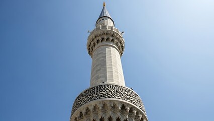 Ornate Minaret against Clear Blue Sky