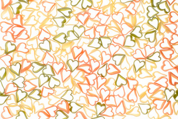 Heart shaped pasta for Valentine’s Day, dry pasta on a white background, symbols of love and...