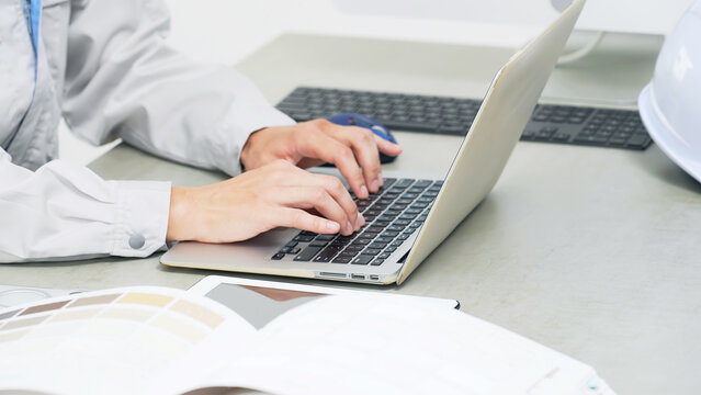 Male worker working on a PC in the office