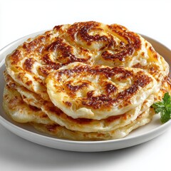 Golden Brown Layered Pancakes Served on a White Plate