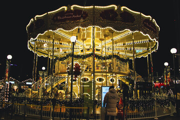 merry go round at christmas market © Yoshima