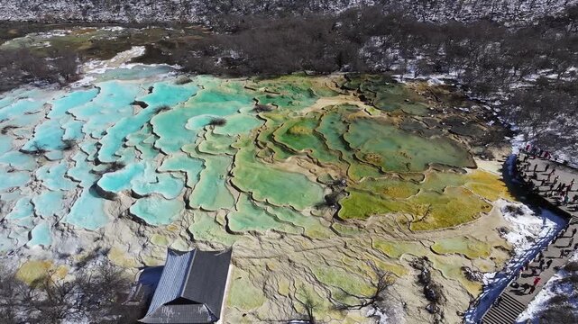 Panorama of multi-colored pond of Huanglong Scenic and Historic Interest Area