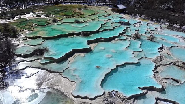 Close up of multi-colored pond at Huanglong Scenic and Historic Interest Area
