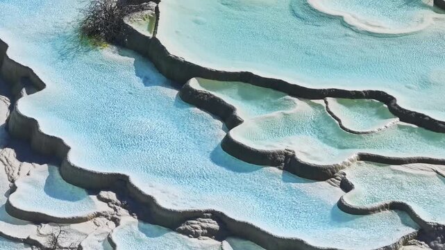 Close up of multi-colored pond at Huanglong Scenic and Historic Interest Area