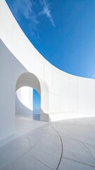 Pristine white curved architecture against a vibrant blue sky and sea