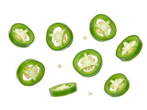 Slices of fresh green jalapeo pepper floating in the air, isolated on transparent background