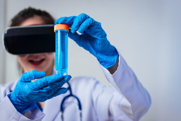 Female doctor wearing virtual reality headset examines blood sample during immersive medical simulation, combining digital healthcare technology,laboratory analysis,and innovative clinical training