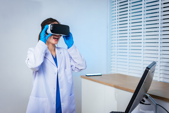 An Asian female doctor uses virtual reality controllers at a clinic desk, exploring immersive medical simulation, digital healthcare training, advanced technology applications, education, diagnosis