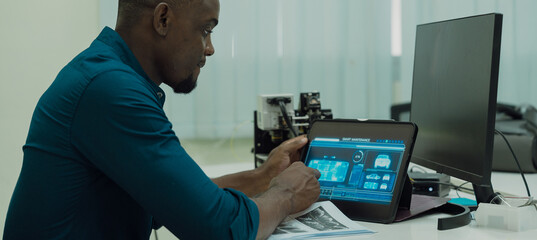 Black engineers are programming in an academic classroom for learning	