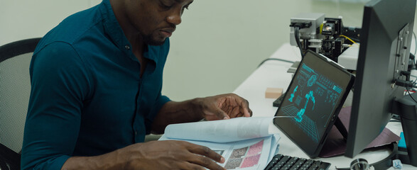 Black engineers are programming in an academic classroom for learning	