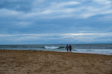 Woonona Beach north of Wollongong, New South Wales, Australia, with a family friendly sandy shoreline, ocean surf, calm swimming areas and the elevated Woonona Rock Pool, photographed January 3, 2026.
