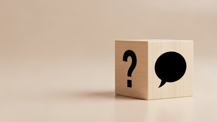 Isolated Wooden Block with Question Mark and Chat Bubble Symbol for FAQ Support and Help Desk Communication