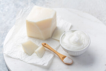 Organic coconut oil for cooking and baking on kitchen table