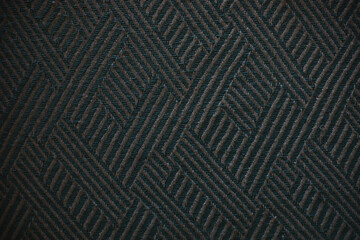 Fototapeta premium Close-Up of Dark Woven Textile with Geometric Pattern: Intricate Texture and Modern Design