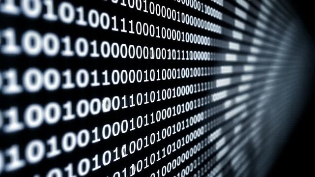 Close-up view of binary code streaming down a dark screen with blurred background and binary numbers.