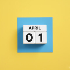 Date blocks showing april first on blue square over bright yellow surface illustration