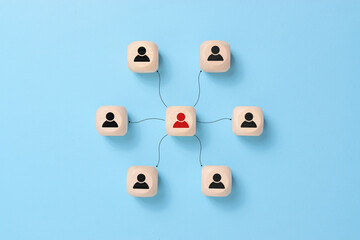 Organization corporate employee structure team business people. Wooden block cube on blue background with human icon