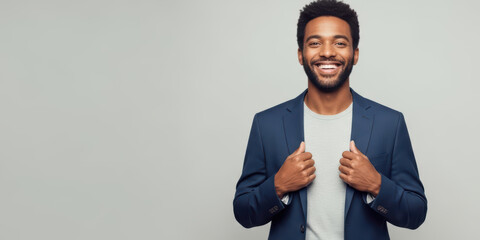 Portrait hand man arm young with cheerful joy joyful laughing background 20s 30s adult male model smiling in suit jacket casual shirt studio light copy space