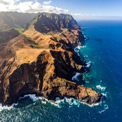 Aerial view of coastal cliffs meeting vast turquoise ocean