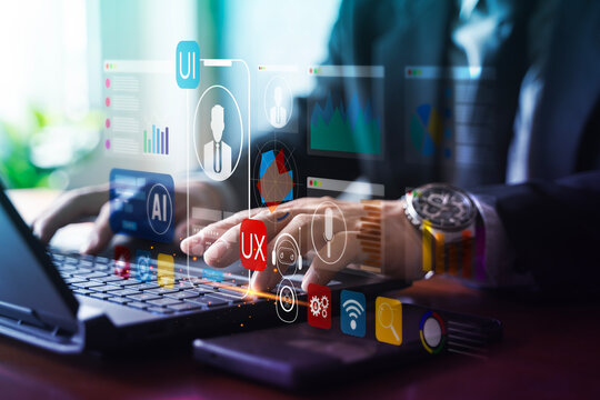 UI UX Design and AI Analytics Dashboard Concept on Laptop Keyboard