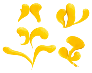 dynamic abstract yellow paint blobs and flowing strokes captured in motion against a stark transparent background.