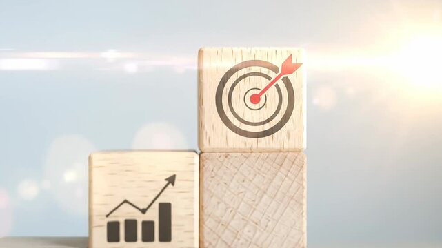 Wooden blocks stacked to represent business growth and achieving goals, success concept.