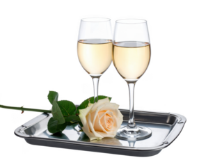 Two wine glasses on a tray with a single rose bud,white background
