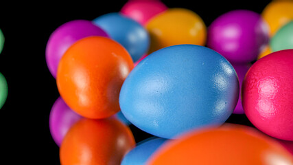 Egg painting process with brushes for making Easter eggs