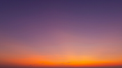 Soft morning light before sunrise with a calm sky and gentle color tones