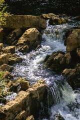 Cascading Water Through Rocky Terrain. Scenic Stream Landscape for Activities in Mountains.