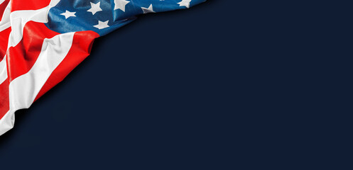 Waving american flag with stars and stripes on dark background