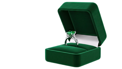 Emerald engagement ring in a velvet jewelry box