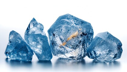 Obraz premium Group of transparent, faceted, blue-toned crystals, on a reflective surface