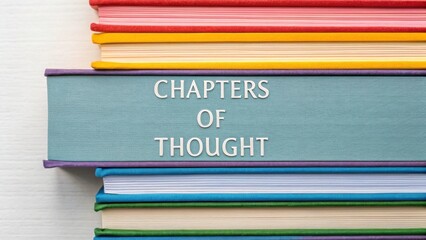 A Colorful Stack of Books Featuring 'Chapters of Thought' for Intellectual Exploration and Learning