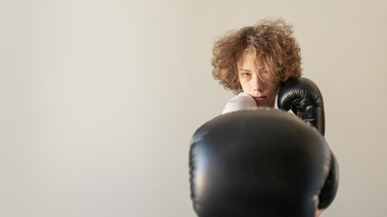 Moody Athletic Portrait of Gen Z Boxer Focusing on Mental Strength and Resilience. Sports Concept for Modern Fitness Branding, Sport Visuals, Self-Defense Awareness and Youth Empowerment Campaigns