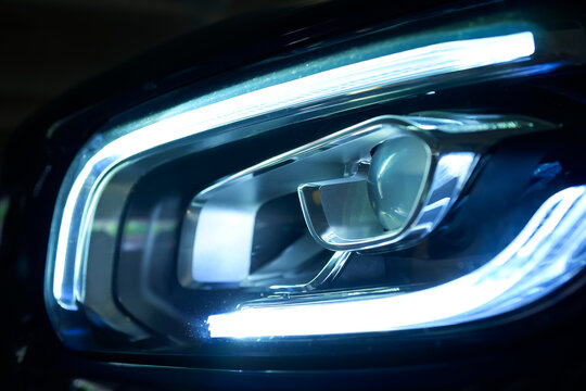 Modern automotive led headlight design illuminating the road