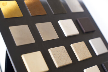 Samples of materials and colors for interior design, furniture and kitchen countertops.