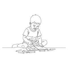 Joyful Child Drawing and Coloring with Crayons