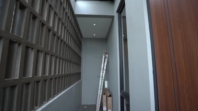 leftover space in a modern home, useful for storing boxes or leftover items, and equipment such as ladders.