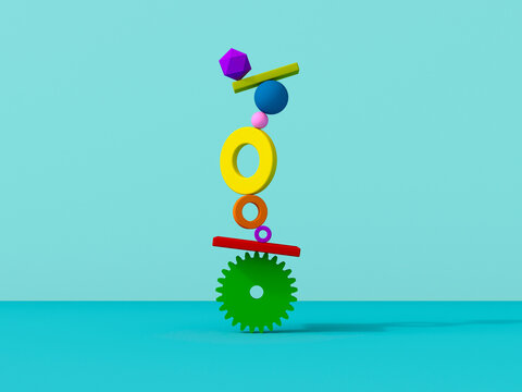 Colorful 3D geometric shapes stacked in balance symbolizing teamwork