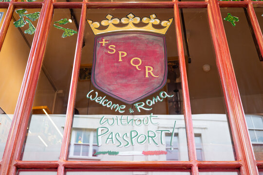 Welcome to Roma Without Passport Signage on Glass Door. London, UK, 1 April 2024