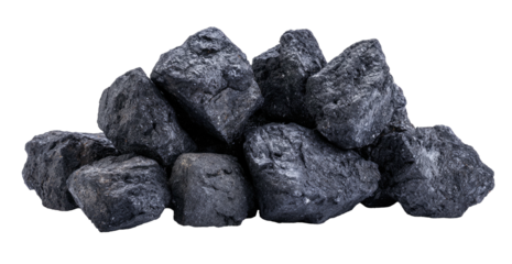 Close-up of a pile of dark, textured, irregular-shaped mineral lumps, isolated on black