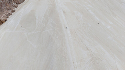 Aerial View of Climbers on Vast White Sand Dune