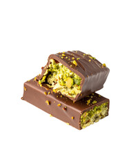 Pieces of Dubai chocolate bars with pistachios and knafeh on white table, isolated on transparent or white background