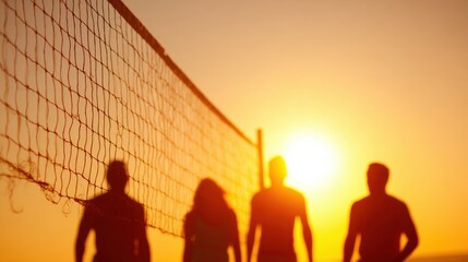 Group plays volleyball against a sunset at the beach during summer