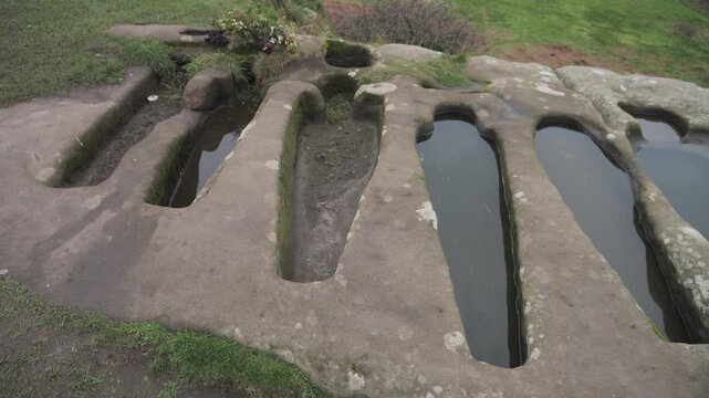 4K: Stone Graves in Heysham, Lancashire. Empty historic and atmospheric Tombs in the concrete. Stock Video Clip Footage