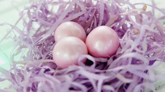 Animation of pearl baubles in violet straw