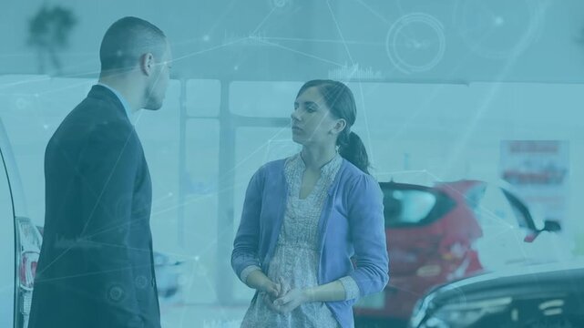 Salesman assures woman she can afford the car with financing help.