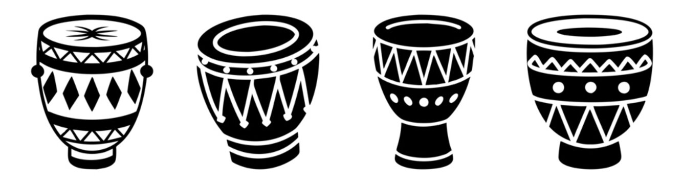 A set of four traditional african djembe drums with unique decorative patterns